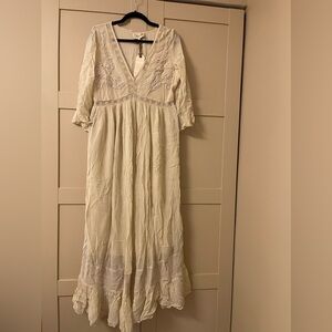 Beyond stunning boho creamy white dress